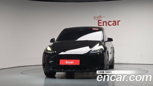 Tesla Model Y 2024 — photo 3