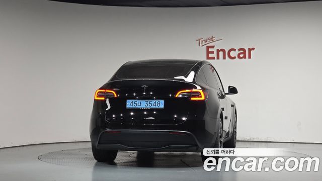 Tesla Model Y 2024 — photo 4