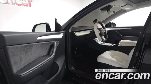 Tesla Model Y 2024 — photo 13