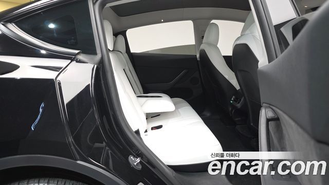 Tesla Model Y 2024 — photo 17