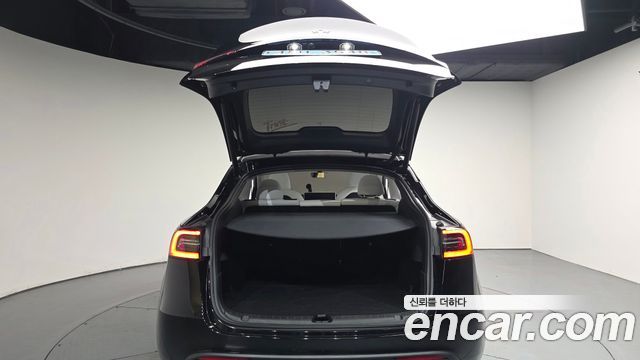 Tesla Model Y 2024 — photo 26