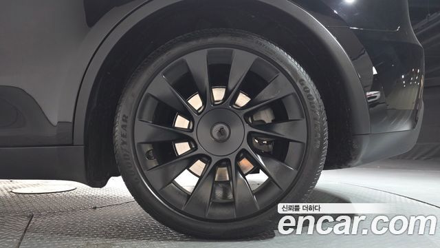 Tesla Model Y 2024 — photo 7