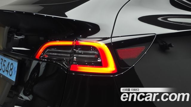 Tesla Model Y 2024 — photo 9