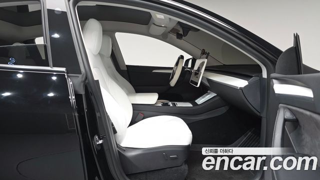 Tesla Model Y 2024 — photo 16
