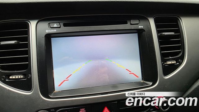 Kia Carens 2015 — photo 21