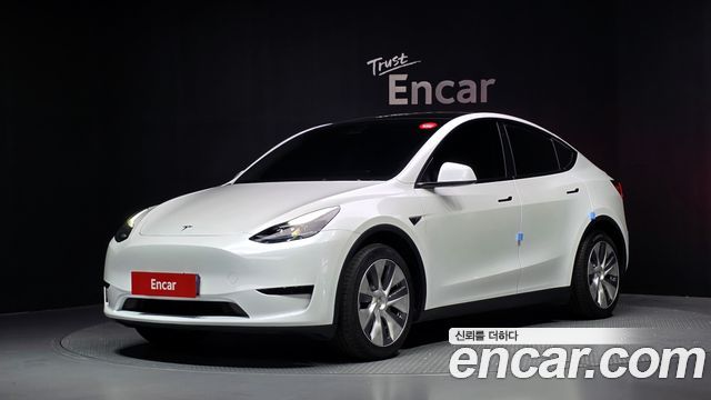 Tesla Model Y 2023 — photo 1