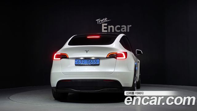 Tesla Model Y 2023 — photo 4