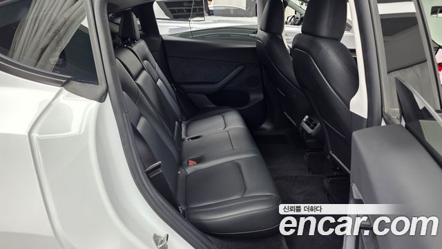 Tesla Model Y 2023 — photo 18