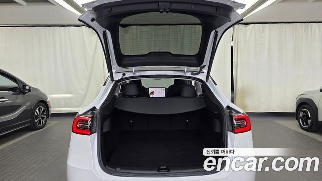 Tesla Model Y 2023 — photo 26