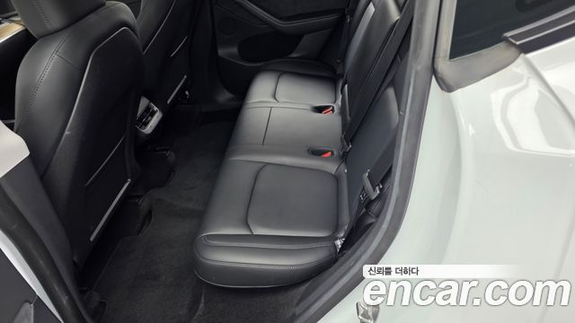 Tesla Model Y 2023 — photo 16