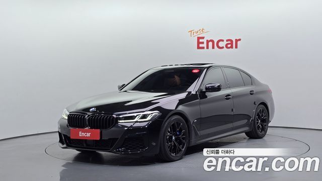 BMW 5-Series 2022 — photo 1
