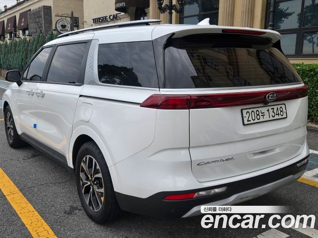 Kia Canival 2021 — photo 2