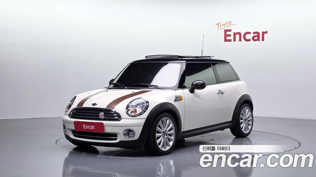 Mini Cooper 2010 — photo 1