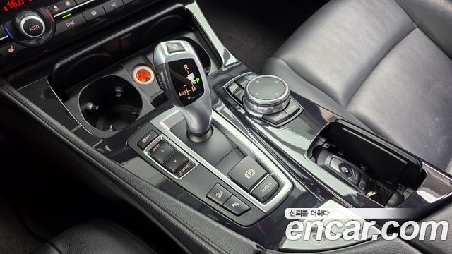 BMW 5-Series 2015 — photo 12