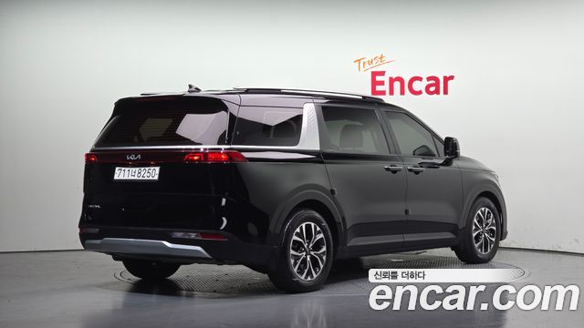 Kia Canival 2023 — photo 2