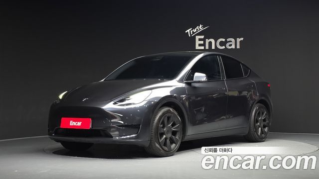 Tesla Model Y 2025 — photo 1