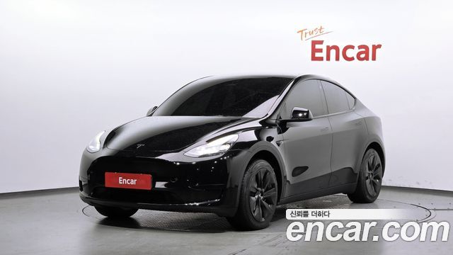 Tesla Model Y 2024 — photo 1