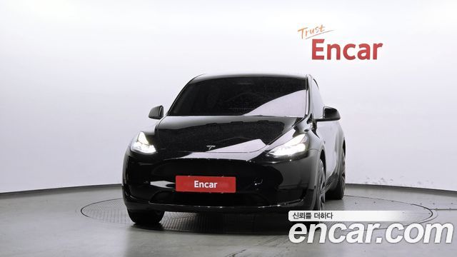 Tesla Model Y 2024 — photo 3