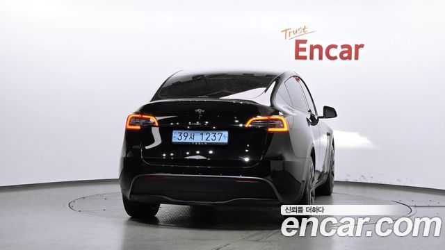 Tesla Model Y 2024 — photo 4