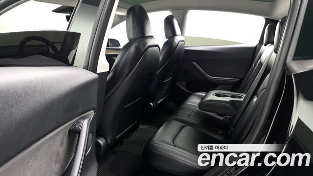 Tesla Model Y 2024 — photo 11