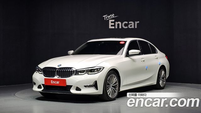 BMW 3-Series 2022 — photo 1