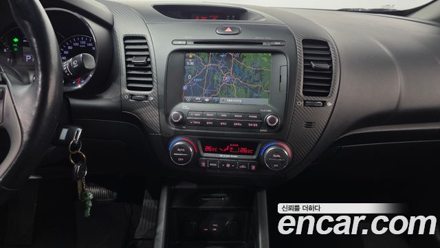 Kia K3 2015 — photo 23