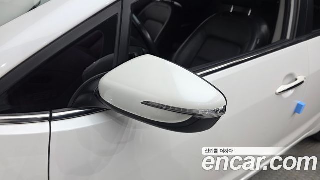 Kia K3 2015 — photo 30