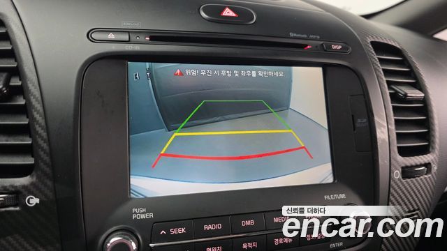 Kia K3 2015 — photo 21