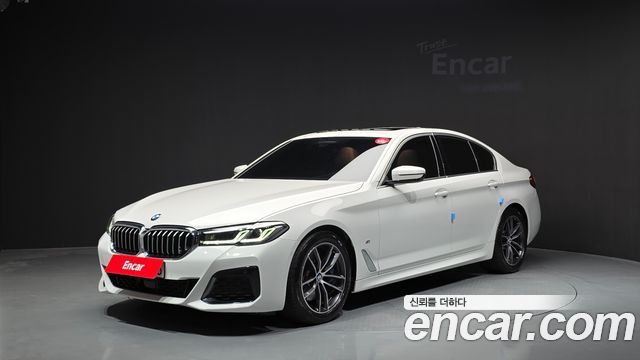 BMW 5-Series 2022 — photo 1