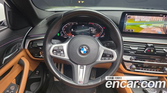 BMW 5-Series 2022 — photo 20