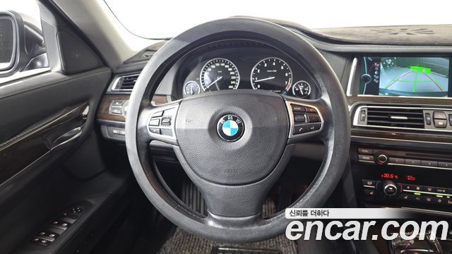 BMW 7-Series 2011 — photo 19