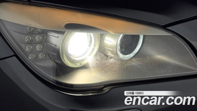 BMW 7-Series 2011 — photo 8