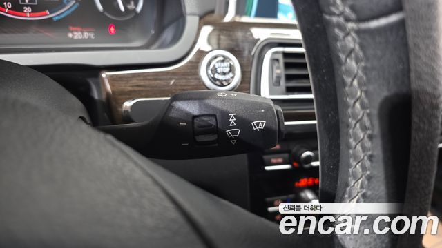 BMW 7-Series 2011 — photo 29