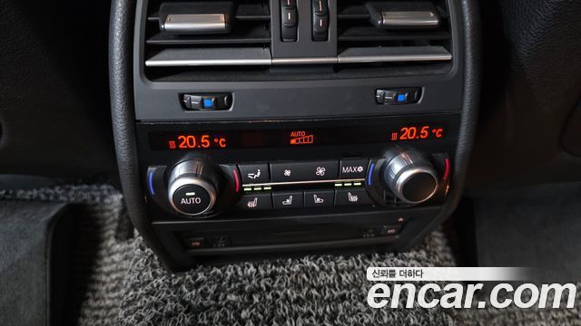 BMW 7-Series 2011 — photo 31