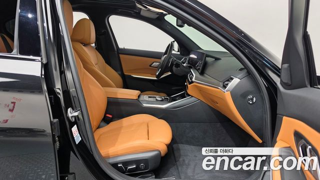 BMW 3-Series 2024 — photo 16