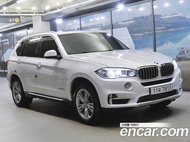 BMW X5 2015 — photo 1