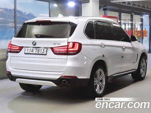 BMW X5 2015 — photo 2
