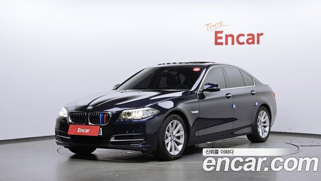 BMW 5-Series 2014 — photo 1