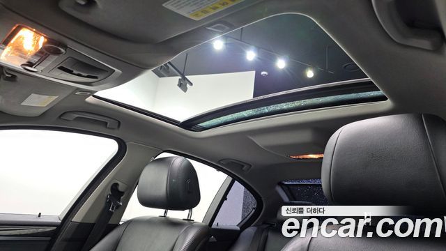 BMW 5-Series 2014 — photo 19
