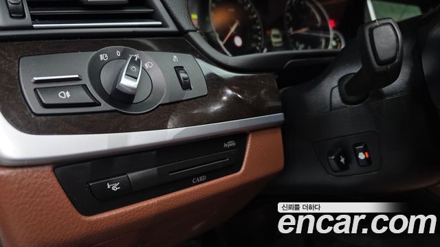 BMW 5-Series 2014 — photo 14