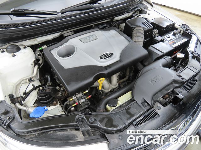 Kia Porte 2013 — photo 19