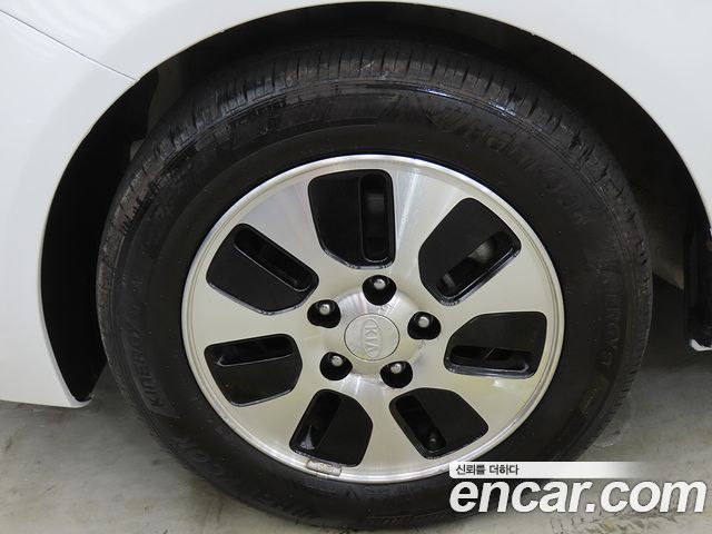 Kia Porte 2013 — photo 20