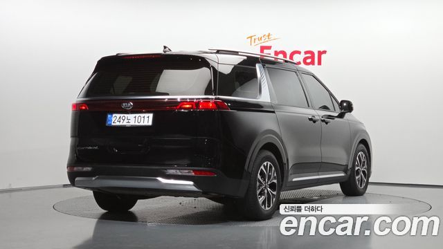 Kia Canival 2021 — photo 2