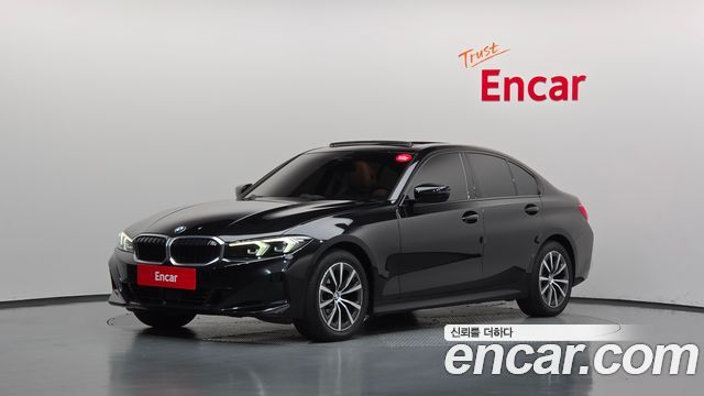 BMW 3-Series 2023 — photo 1