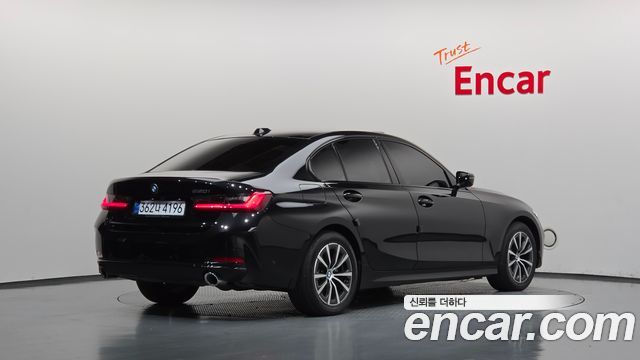 BMW 3-Series 2023 — photo 2