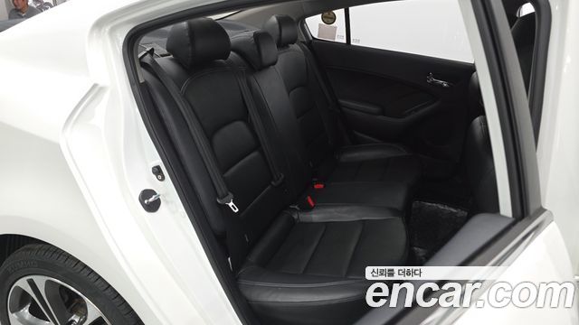 Kia K3 2013 — photo 18