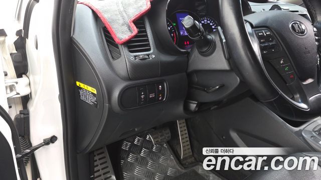 Kia K3 2013 — photo 19