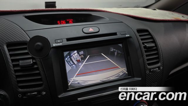 Kia K3 2013 — photo 22