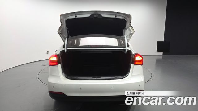 Kia K3 2013 — photo 26