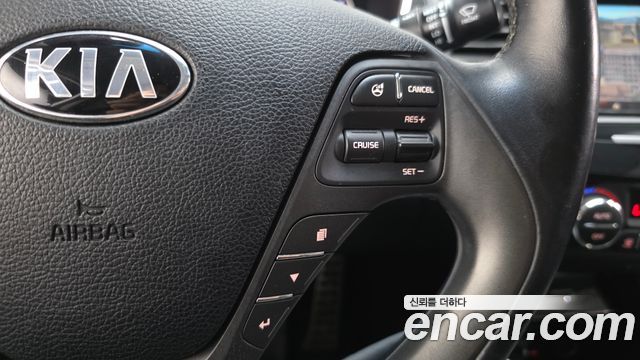 Kia K3 2013 — photo 33